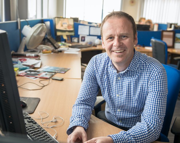 BAE Systems Pete Boddy sitting at his desk